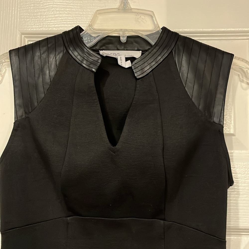 BCBGeneration perfect lite Black dress. Empire style. Faux leather trim size 4.